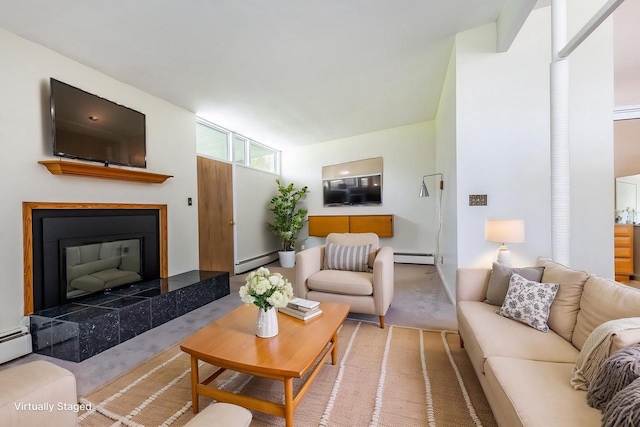 30 Elmer St, Platteville, WI 53818 - living room with a baseboard radiator, carpet floors, and a tile fireplace