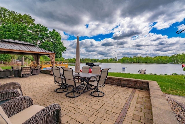 W11601 Demynck Rd, Lodi, WI 53555 - view of patio with a gazebo, a water view, and outdoor dining space