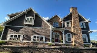 W11601 Demynck Rd, Lodi, WI 53555 - craftsman house with a chimney
