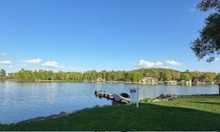 W11601 Demynck Rd, Lodi, WI 53555 - dock featuring a water view and a yard