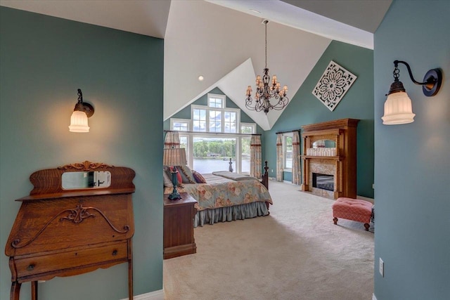 W11601 Demynck Rd, Lodi, WI 53555 - carpeted bedroom featuring high vaulted ceiling, a chandelier, a premium fireplace, baseboards, and a water view