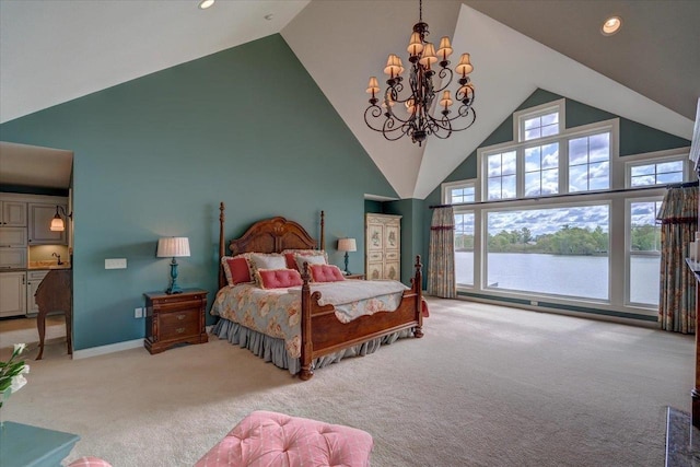 W11601 Demynck Rd, Lodi, WI 53555 - bedroom featuring light carpet, high vaulted ceiling, a chandelier, a water view, and recessed lighting