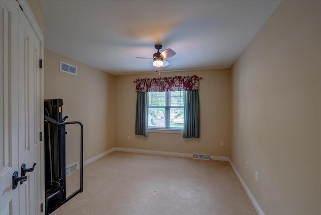 W11601 Demynck Rd, Lodi, WI 53555 - exercise area with ceiling fan, light carpet, and baseboards