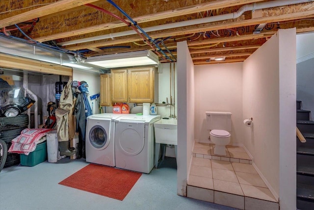 W11601 Demynck Rd, Lodi, WI 53555 - laundry room with washing machine and dryer and cabinet space