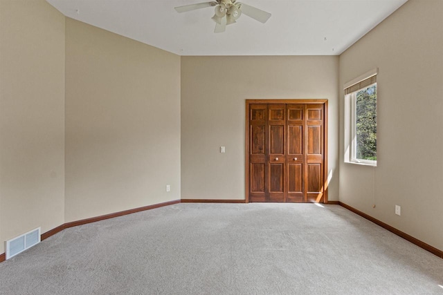 6056 Sharonwood Ln, Stevens Point, WI 54482 - unfurnished room with carpet floors, a ceiling fan, and baseboards