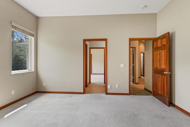 6056 Sharonwood Ln, Stevens Point, WI 54482 - unfurnished bedroom with carpet flooring and baseboards