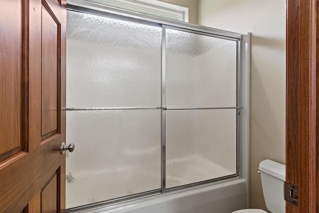 6056 Sharonwood Ln, Stevens Point, WI 54482 - full bath with enclosed tub / shower combo and toilet