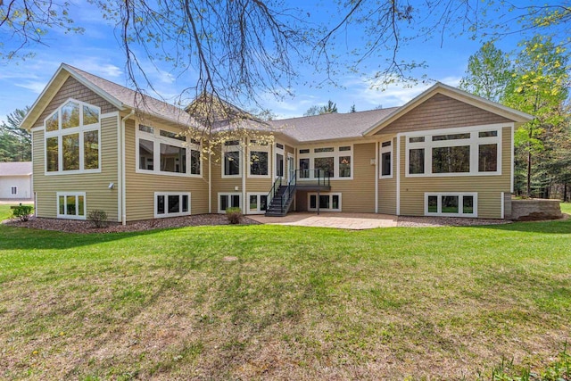 6056 Sharonwood Ln, Stevens Point, WI 54482 - back of house with a patio area, a lawn, and stairs