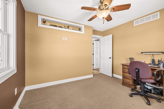 N8608 Strat Rd, Iola, WI 54945 - carpeted office featuring baseboards and a ceiling fan