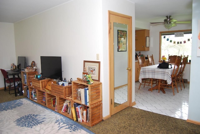 3207 County Rd W, Port Washington, WI 53074 - carpeted living area with a ceiling fan and baseboards