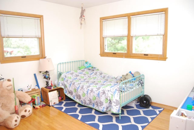 3207 County Rd W, Port Washington, WI 53074 - bedroom with wood finished floors and baseboards