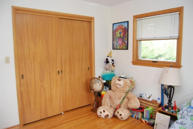3207 County Rd W, Port Washington, WI 53074 - bedroom featuring light wood-style flooring and a closet