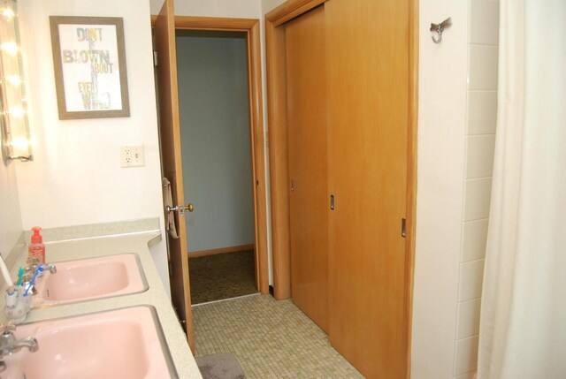 3207 County Rd W, Port Washington, WI 53074 - bathroom featuring dual sinks