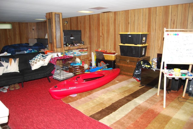 3207 County Rd W, Port Washington, WI 53074 - living room with wooden walls and carpet floors