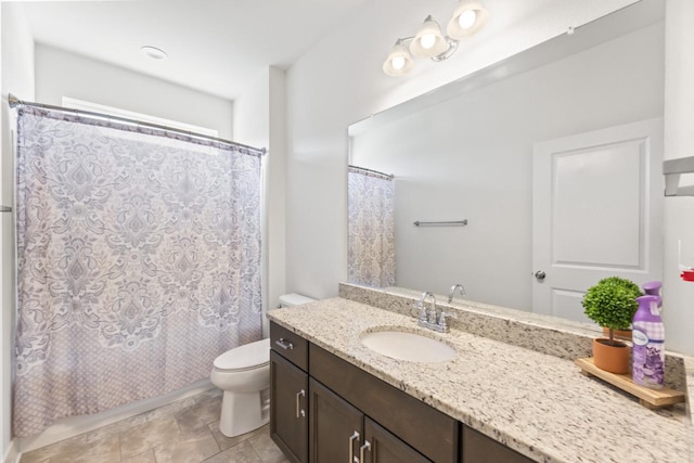 full bath with toilet, vanity, and shower / tub combo with curtain