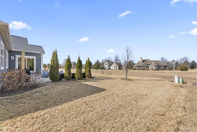 3141 Mineral Springs Blvd, Oconomowoc, WI 53066 - view of grassy yard featuring a residential view