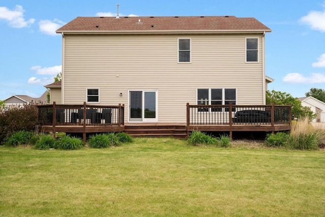416 Rimrock Rd, Janesville, WI 53548 - back of property with a wooden deck and a lawn