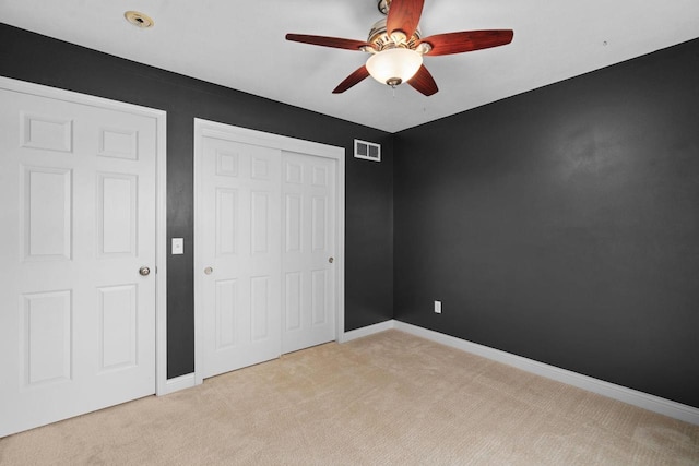 416 Rimrock Rd, Janesville, WI 53548 - unfurnished bedroom with light colored carpet, a closet, baseboards, and a ceiling fan