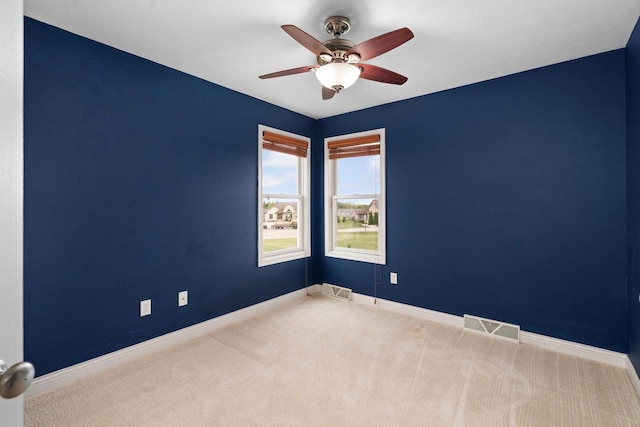 416 Rimrock Rd, Janesville, WI 53548 - spare room with carpet flooring, baseboards, and a ceiling fan