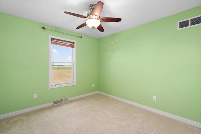 416 Rimrock Rd, Janesville, WI 53548 - spare room featuring ceiling fan, light carpet, and baseboards