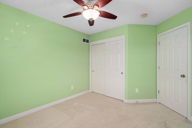 416 Rimrock Rd, Janesville, WI 53548 - unfurnished bedroom with a closet, baseboards, carpet floors, and a ceiling fan