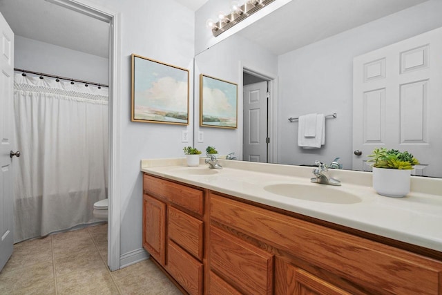416 Rimrock Rd, Janesville, WI 53548 - full bathroom with tile patterned floors, toilet, double vanity, and curtained shower