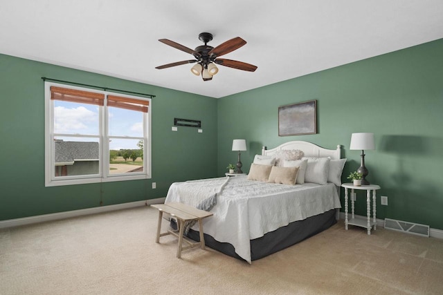 416 Rimrock Rd, Janesville, WI 53548 - carpeted bedroom with baseboards and ceiling fan