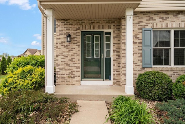 416 Rimrock Rd, Janesville, WI 53548 - entrance to property with covered porch and brick siding