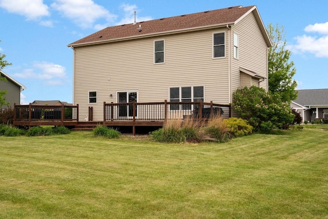 416 Rimrock Rd, Janesville, WI 53548 - rear view of property with a deck and a yard