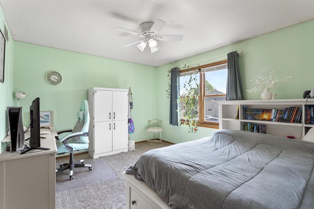 2425 Sandstone Ct, Oshkosh, WI 54904 - carpeted bedroom with a ceiling fan and baseboards