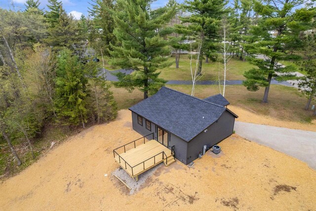 401 George St, Crivitz, WI 54114 - aerial view of property and surrounding area with a tree filled landscape