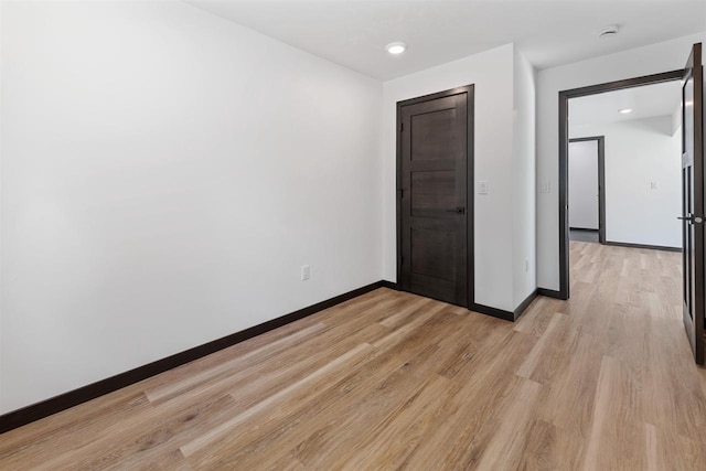 401 George St, Crivitz, WI 54114 - unfurnished bedroom with light wood-style floors and baseboards