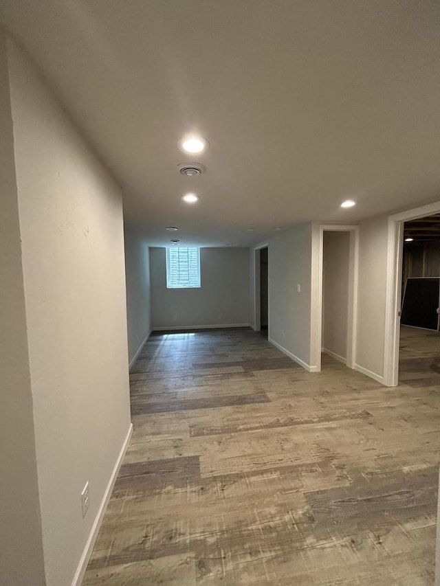 1341 S Wilson Ave Unit 10-4, Hartford, WI 53027 - below grade area with wood finished floors, recessed lighting, and baseboards
