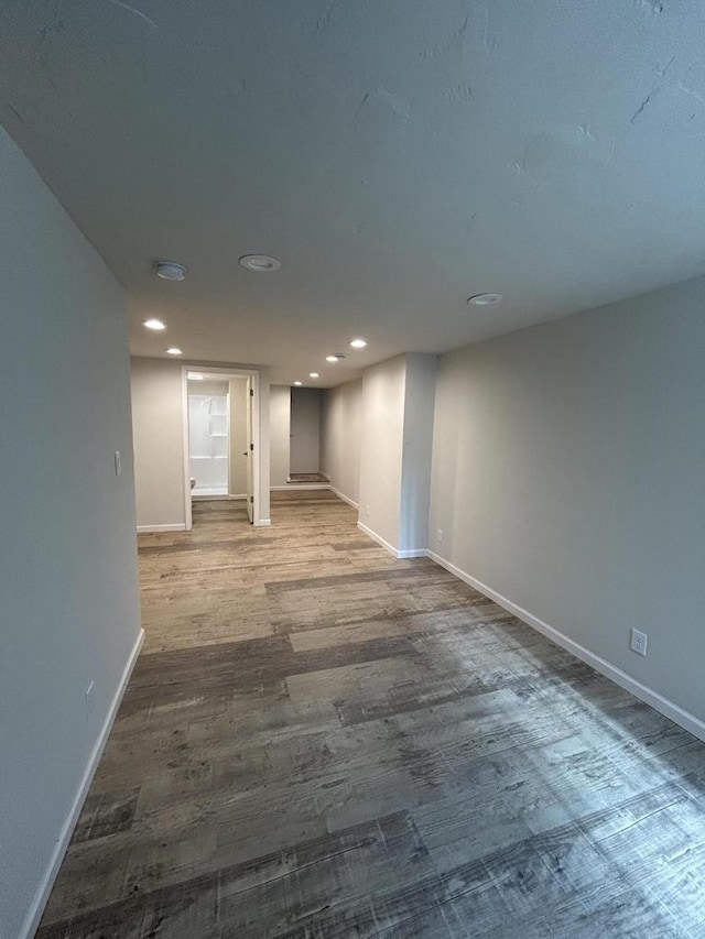 1341 S Wilson Ave Unit 10-4, Hartford, WI 53027 - finished basement featuring wood finished floors, baseboards, and recessed lighting