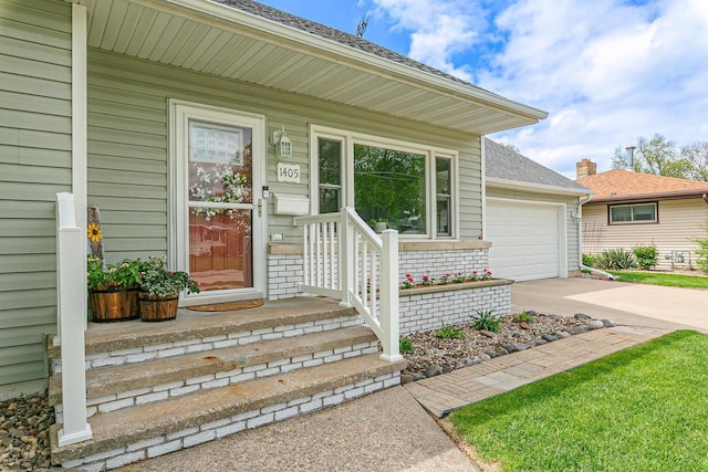 property entrance featuring driveway and roof with shingles