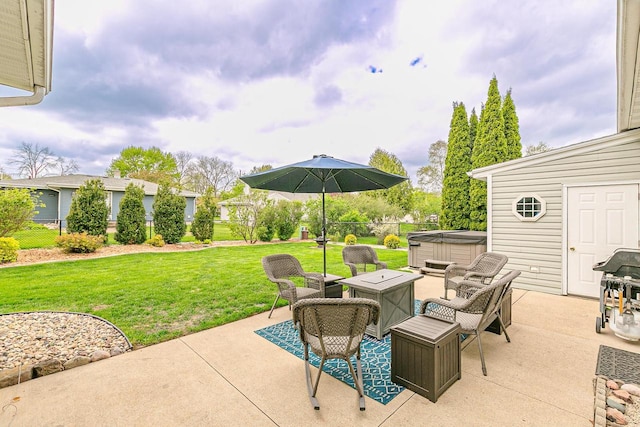 view of patio / terrace featuring a hot tub