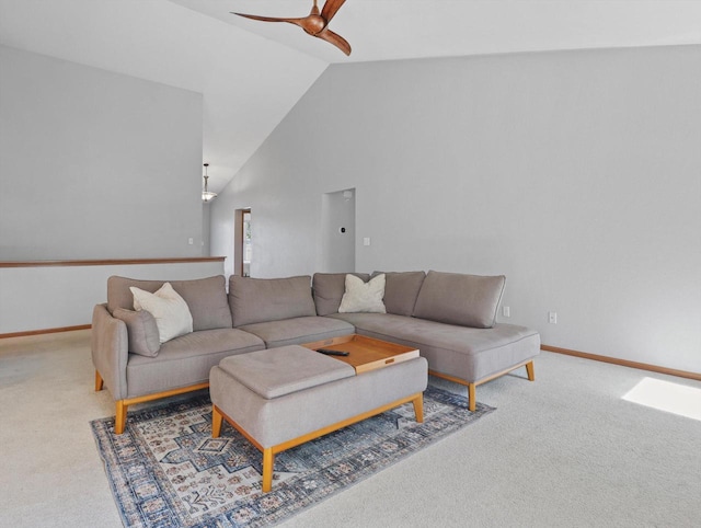 1537 Whitewater Dr, West Bend, WI 53095 - carpeted living room featuring ceiling fan, vaulted ceiling, and baseboards