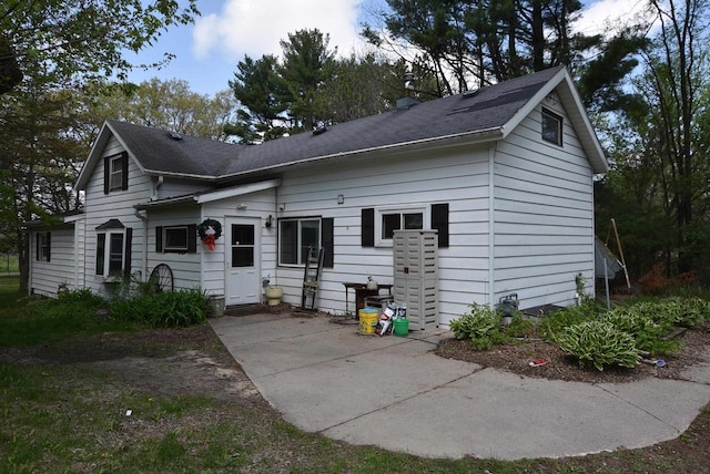 1118 E Pearl St, Neshkoro, WI 54960 - view of front facade featuring a shingled roof