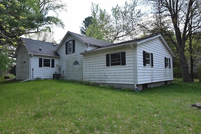 1118 E Pearl St, Neshkoro, WI 54960 - view of front of home featuring a front yard and central air condition unit