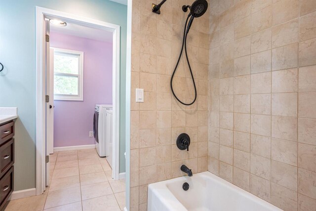 1725 Algonquin Dr, Baraboo, WI 53913 - full bathroom featuring washing machine and dryer, vanity,  shower combination, tile patterned floors, and baseboards