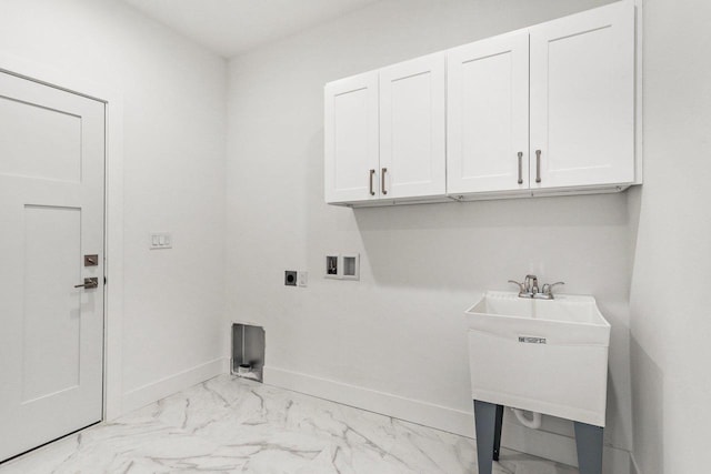80 Oak Ridge Trl, Deerfield, WI 53531 - clothes washing area with cabinet space, electric dryer hookup, light marble finish floors, and baseboards