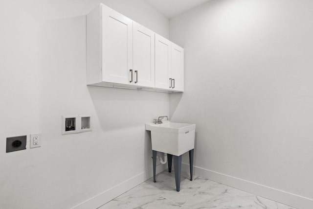 80 Oak Ridge Trl, Deerfield, WI 53531 - laundry room with cabinet space, electric dryer hookup, light marble finish floors, and baseboards