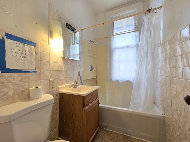 837 S 19th St, Milwaukee, WI 53204 - bathroom featuring tile walls, toilet, shower / tub combo, and vanity