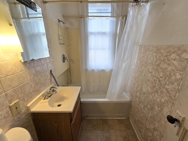 837 S 19th St, Milwaukee, WI 53204 - bathroom with tile walls, vanity, toilet, and shower / bath combination with curtain