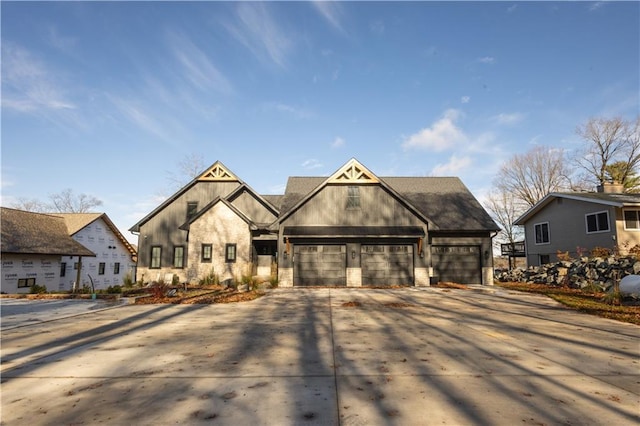 2936 W Sunset Bay, Birchwood, WI 54817 - view of front of house with concrete driveway and an attached garage
