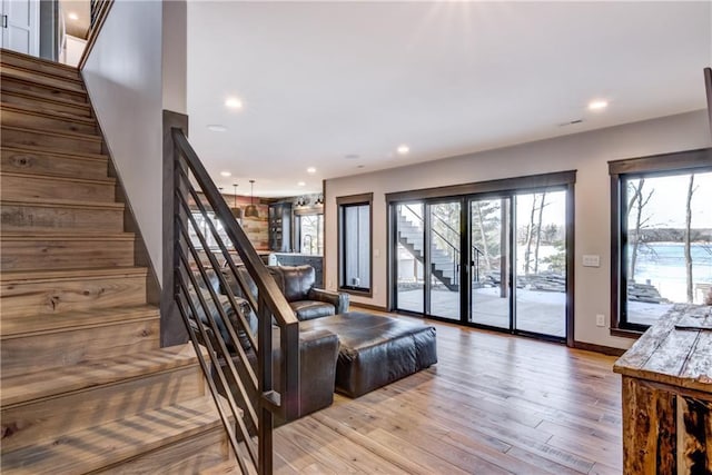 2936 W Sunset Bay, Birchwood, WI 54817 - staircase with wood finished floors, recessed lighting, and baseboards