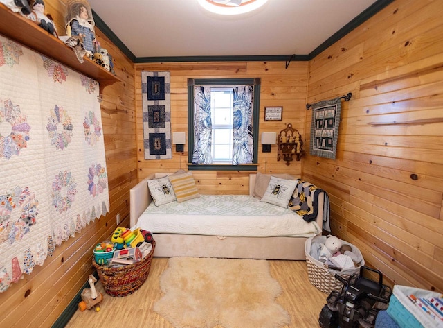 6209 Cassidy Rd, Mineral Point, WI 53565 - bedroom with ornamental molding, wood walls, and wood finished floors