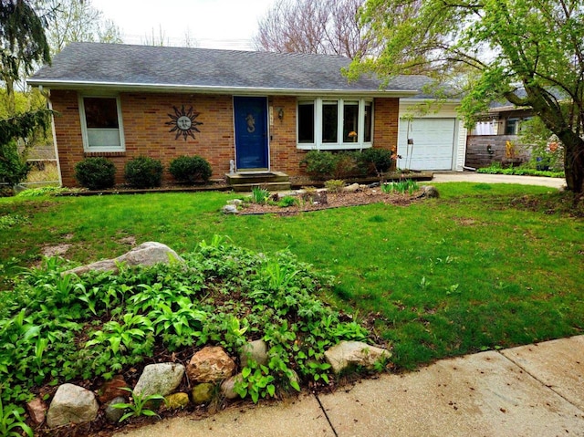 5449 Old Middleton Rd, Madison, WI 53705 - ranch-style home featuring a garage, brick siding, a front yard, and concrete driveway