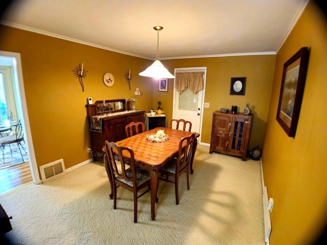 5449 Old Middleton Rd, Madison, WI 53705 - dining space featuring crown molding, light carpet, and baseboards