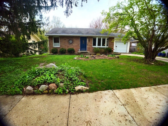 5449 Old Middleton Rd, Madison, WI 53705 - ranch-style home with an attached garage, brick siding, driveway, and a front yard